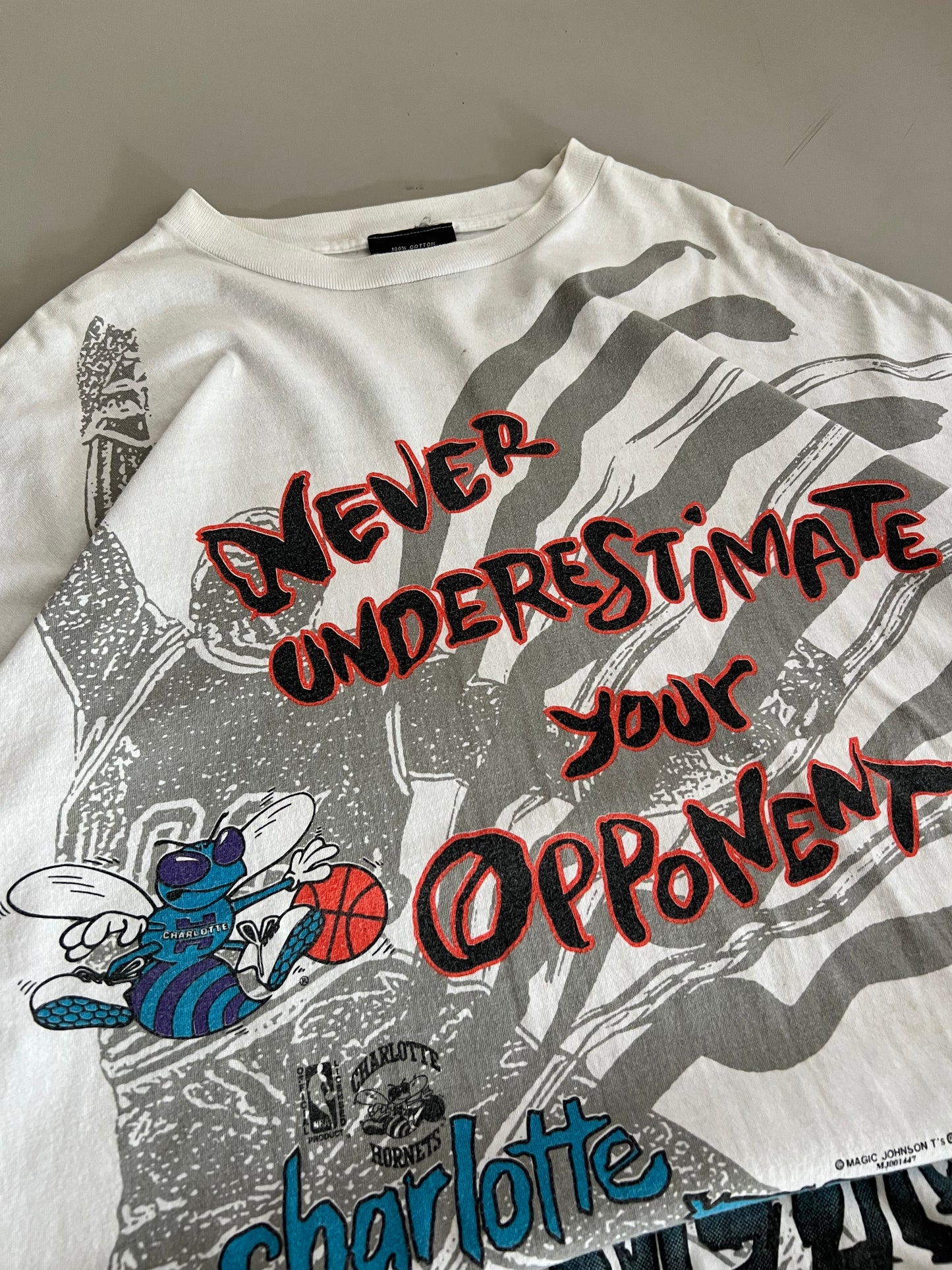 XL 90s Charlotte Hornets AOP T-shirt